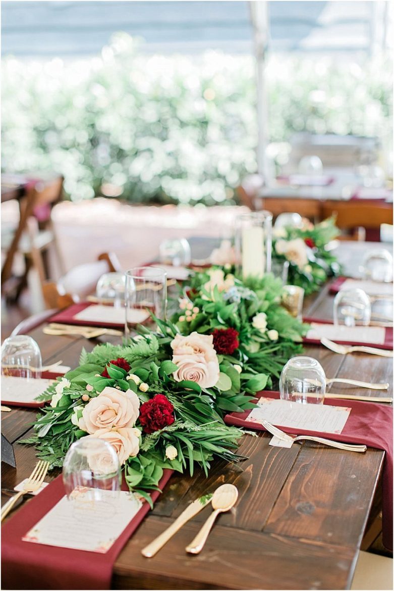 Vineyard outdoor reception tables, floral garland