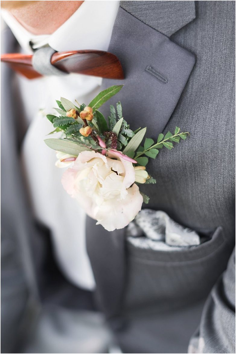 boutonniere and wooden bowtie
