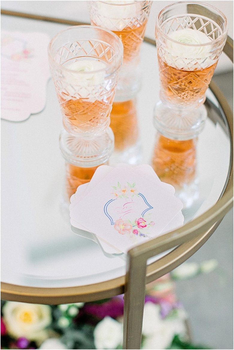 Cocktail hour, custom monogram coasters, wedding, champagne with floral in it